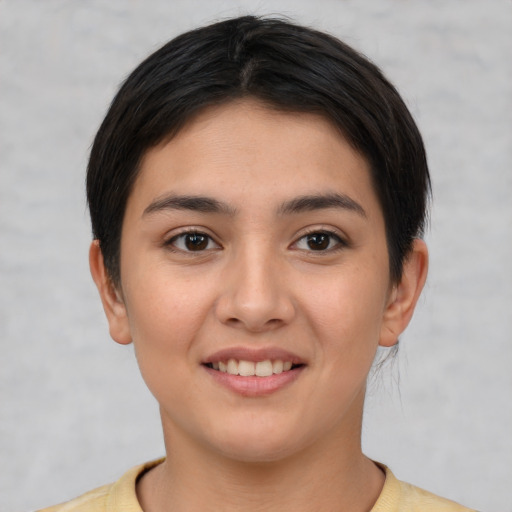 Joyful white young-adult female with short  brown hair and brown eyes