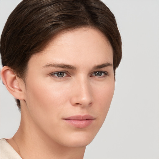 Neutral white young-adult female with short  brown hair and brown eyes