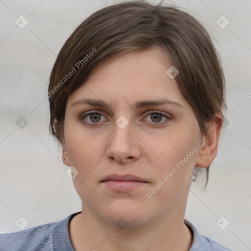 Neutral white young-adult female with short  brown hair and brown eyes