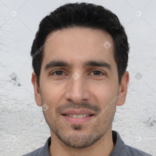 Joyful white young-adult male with short  black hair and brown eyes