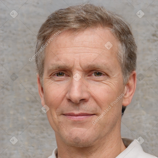 Joyful white middle-aged male with short  brown hair and brown eyes