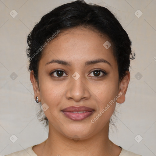 Joyful latino young-adult female with medium  brown hair and brown eyes