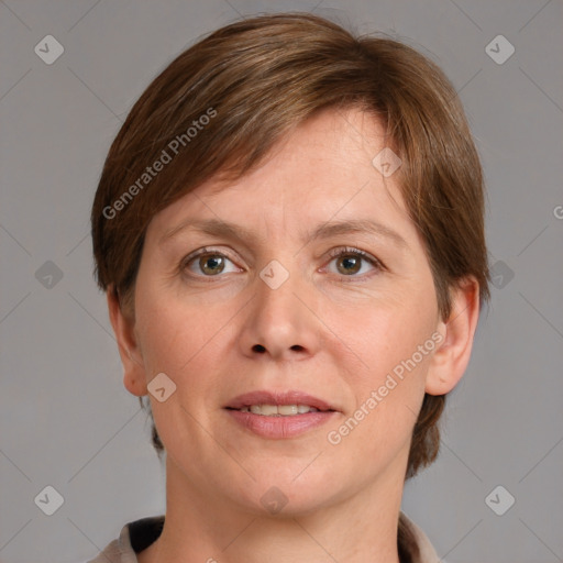 Joyful white adult female with medium  brown hair and grey eyes