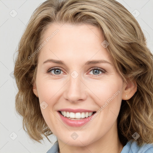 Joyful white young-adult female with medium  brown hair and blue eyes