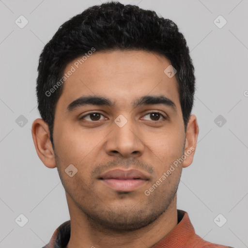 Neutral latino young-adult male with short  black hair and brown eyes