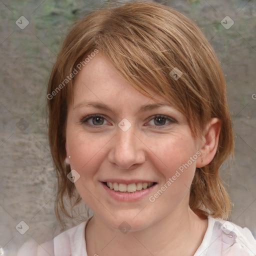 Joyful white young-adult female with medium  brown hair and blue eyes