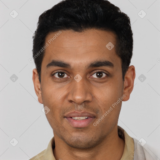 Joyful latino young-adult male with short  black hair and brown eyes