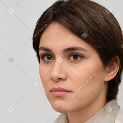 Neutral white young-adult female with medium  brown hair and brown eyes