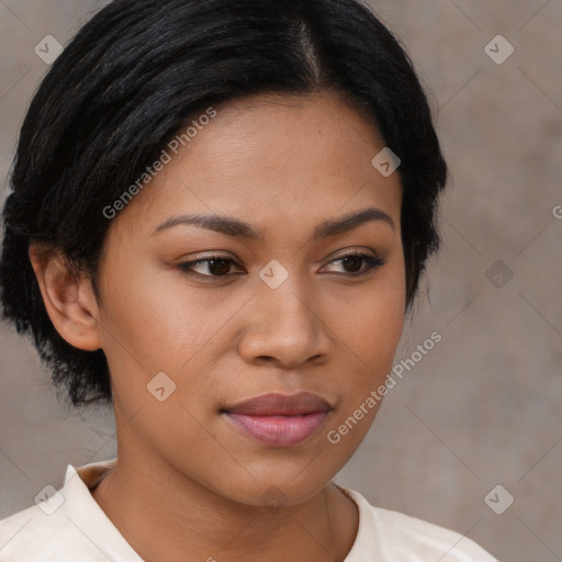 Joyful latino young-adult female with short  brown hair and brown eyes