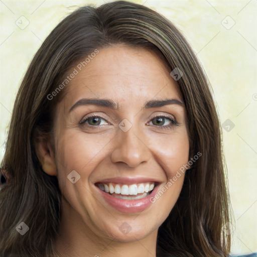 Joyful white young-adult female with long  brown hair and brown eyes