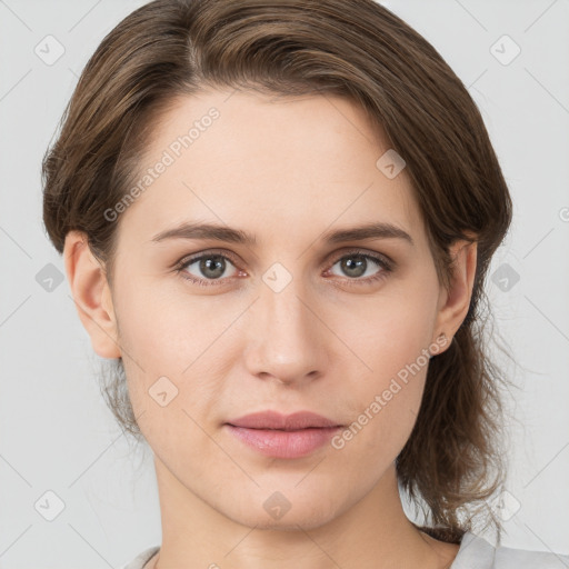 Neutral white young-adult female with medium  brown hair and brown eyes