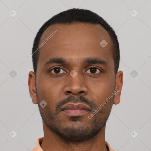 Neutral latino young-adult male with short  black hair and brown eyes