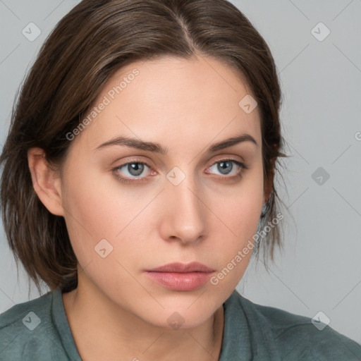 Neutral white young-adult female with medium  brown hair and grey eyes