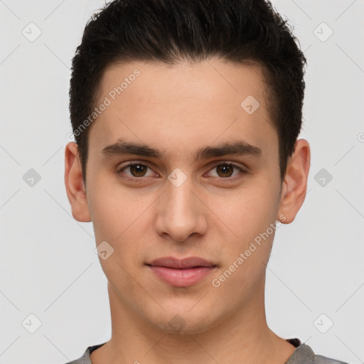 Joyful white young-adult male with short  brown hair and brown eyes