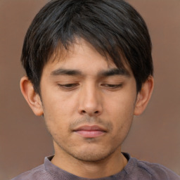 Neutral asian young-adult male with short  brown hair and brown eyes