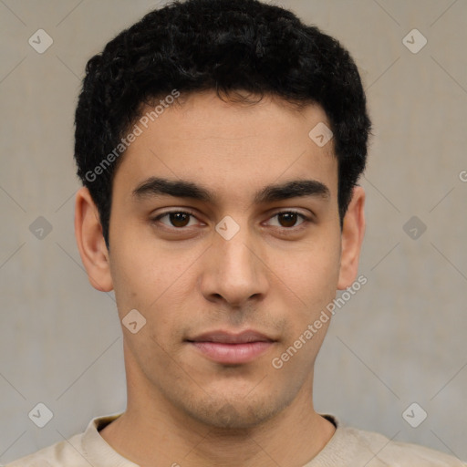 Neutral latino young-adult male with short  black hair and brown eyes