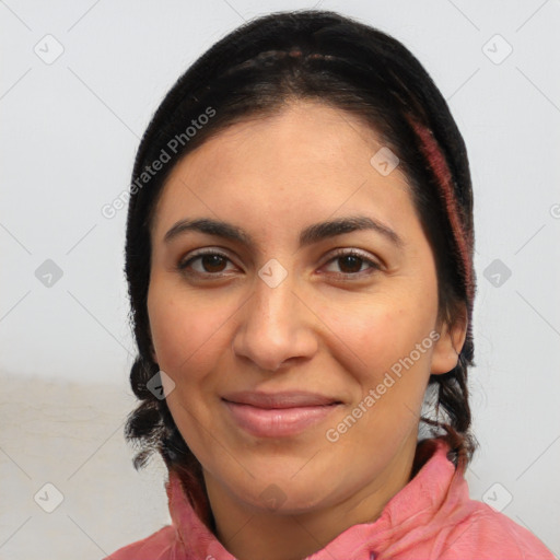 Joyful latino young-adult female with medium  brown hair and brown eyes