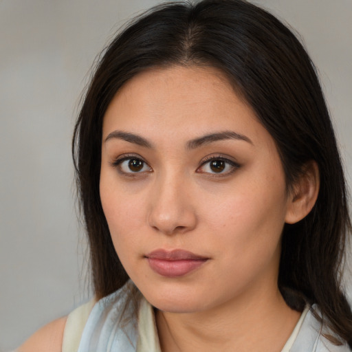 Neutral white young-adult female with medium  brown hair and brown eyes