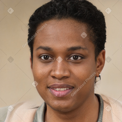 Joyful black young-adult female with short  brown hair and brown eyes