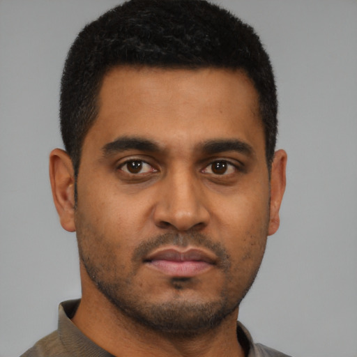Neutral black young-adult male with short  black hair and brown eyes