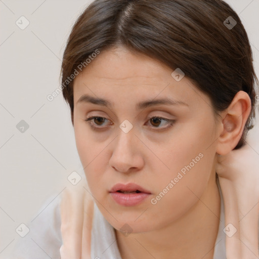 Neutral white young-adult female with short  brown hair and brown eyes