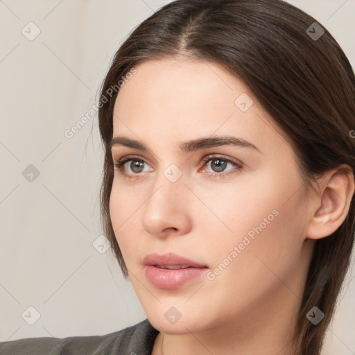 Neutral white young-adult female with medium  brown hair and brown eyes