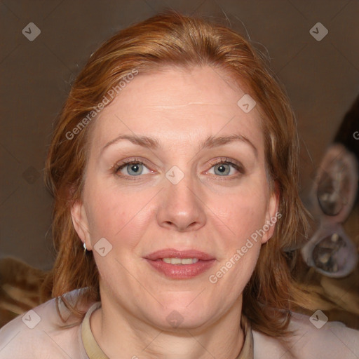 Joyful white adult female with medium  brown hair and blue eyes