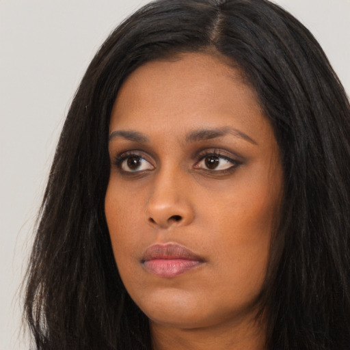 Neutral asian young-adult female with long  black hair and brown eyes