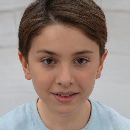 Joyful white child female with short  brown hair and brown eyes