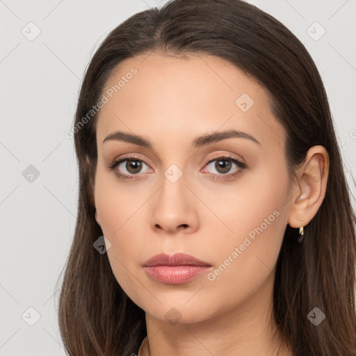 Neutral white young-adult female with long  brown hair and brown eyes