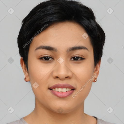 Joyful asian young-adult female with short  black hair and brown eyes