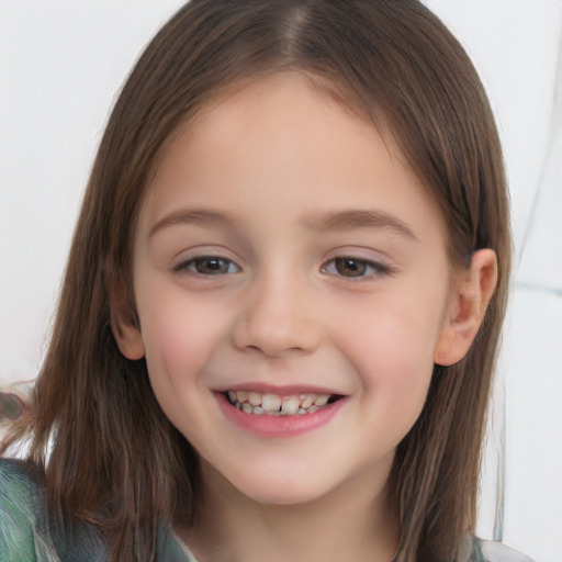 Joyful white child female with long  brown hair and brown eyes