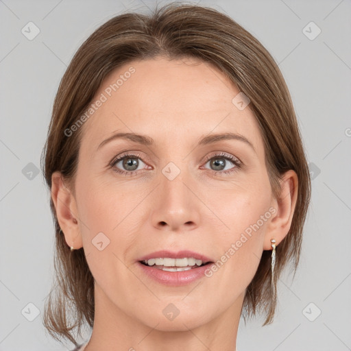 Joyful white adult female with medium  brown hair and grey eyes