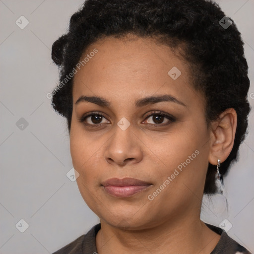 Joyful latino young-adult female with short  black hair and brown eyes