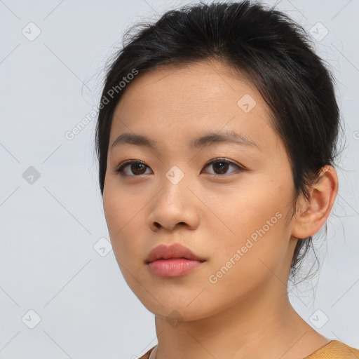 Neutral asian young-adult female with medium  brown hair and brown eyes