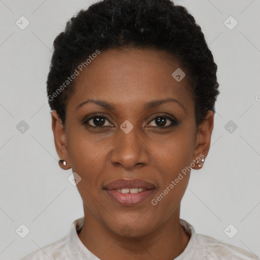 Joyful black young-adult female with short  black hair and brown eyes