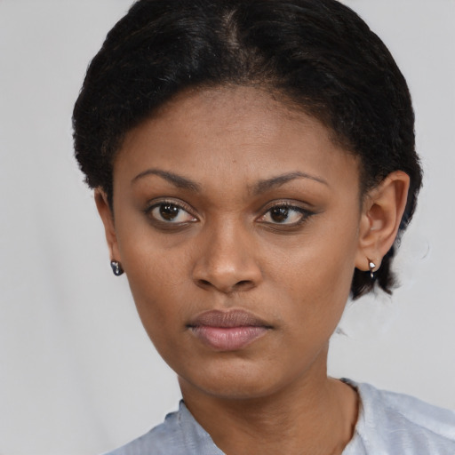 Neutral black young-adult female with short  black hair and brown eyes
