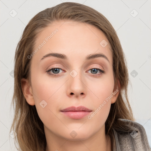 Neutral white young-adult female with long  brown hair and brown eyes