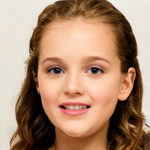 Joyful white child female with long  brown hair and brown eyes