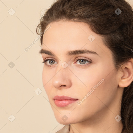 Neutral white young-adult female with medium  brown hair and brown eyes