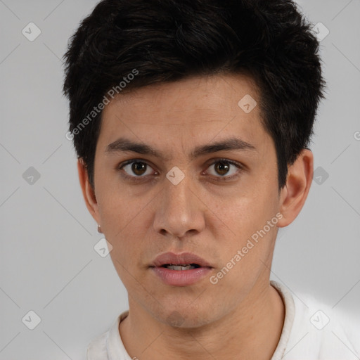 Neutral white young-adult male with short  black hair and brown eyes