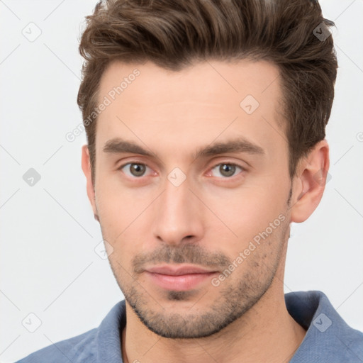 Neutral white young-adult male with short  brown hair and brown eyes