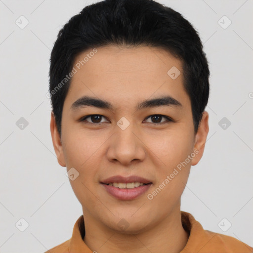 Joyful asian young-adult male with short  black hair and brown eyes