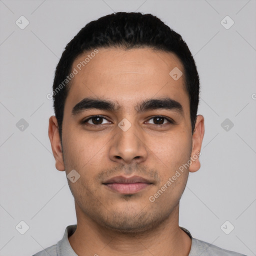 Neutral latino young-adult male with short  black hair and brown eyes