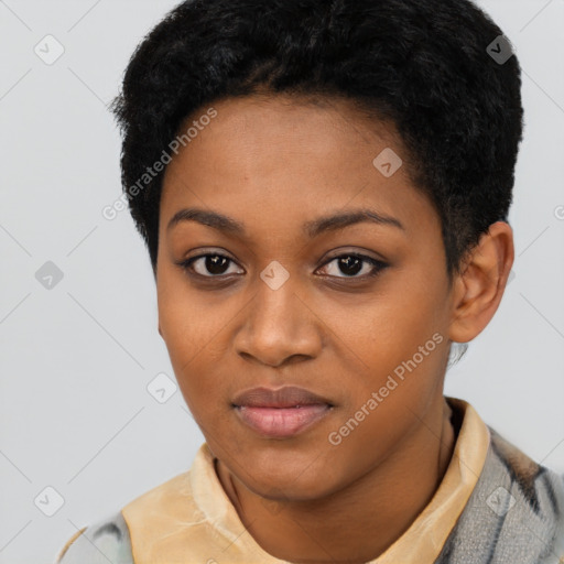 Joyful black young-adult female with short  black hair and brown eyes