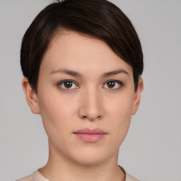 Neutral white young-adult female with short  brown hair and brown eyes