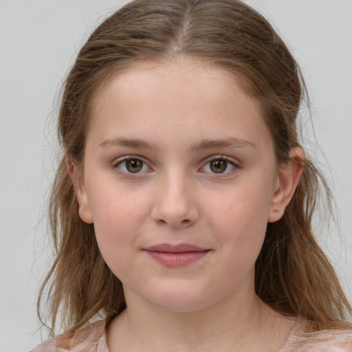 Joyful white child female with medium  brown hair and brown eyes