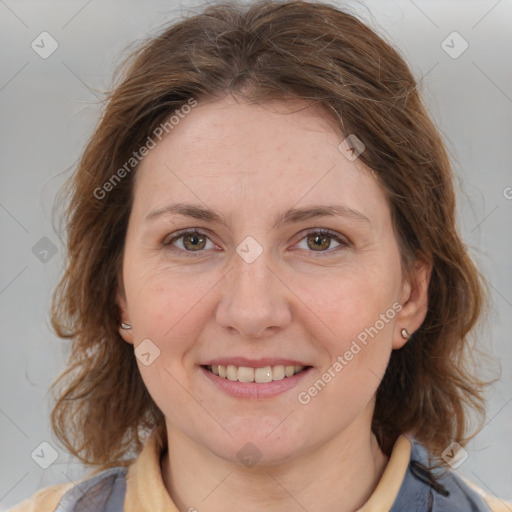 Joyful white young-adult female with medium  brown hair and blue eyes