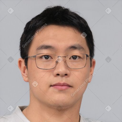 Neutral asian young-adult male with short  brown hair and brown eyes