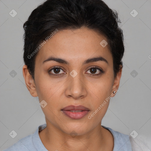 Joyful latino young-adult female with short  brown hair and brown eyes